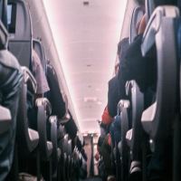 Airplane aisle corridor is a long journey