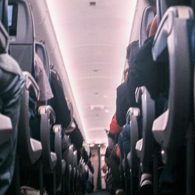 Airplane aisle corridor is a long journey