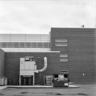 Unsightly Machines at the back of building