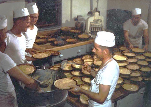 Baker 2nd class Harold "Buster" Campbell at work in the USS Missouri bakery