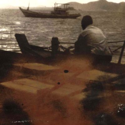 Si Chan, Thailand; Fishermen heading out at Dawn
