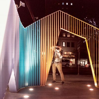 Photographer in an art installation
