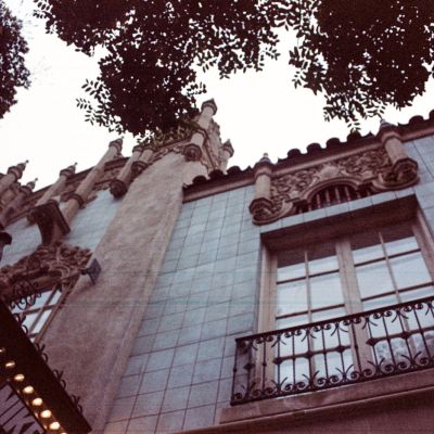 Twilight reflections off a building facade