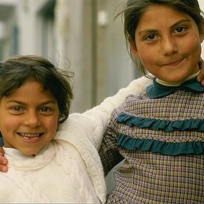 Two Romani Girls Playing in the Street