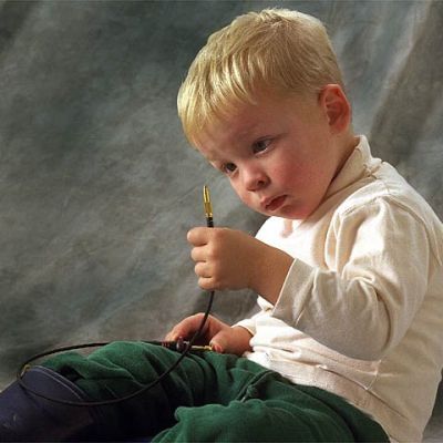 Lukie-the emergency back-up son-examining the intricacies of photography